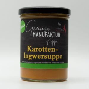 Prudktbild Karotten-Ingwersuppe, Das Bild zeigt das Gericht abgefüllt im Glas mit einem Etikett